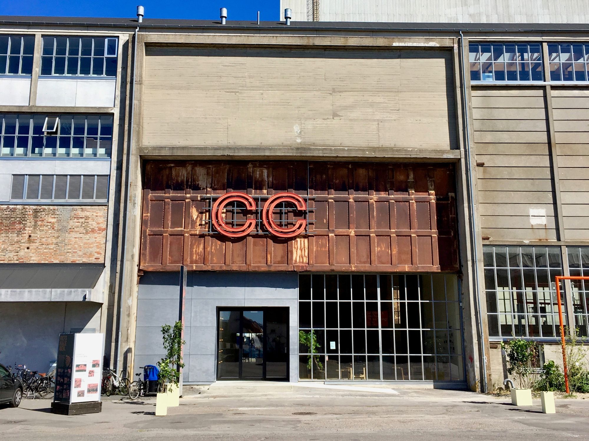 Industrial building facade with CC sign